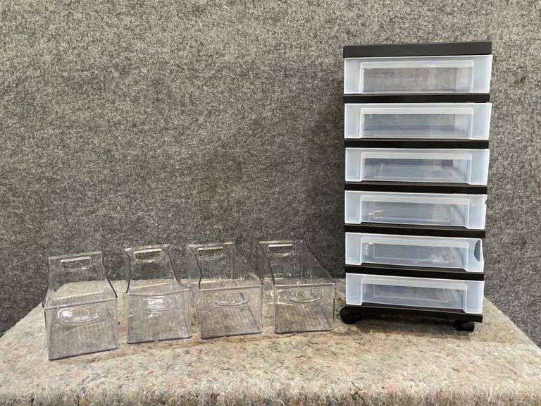 4 Storage Bins And One 6 Drawer Plastic Storage Cart