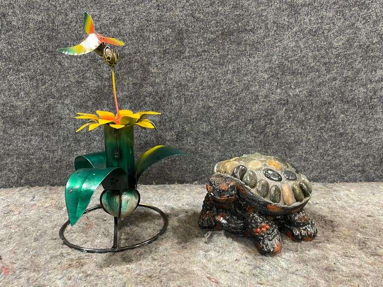 Rock Turtle And Small Metal Flower