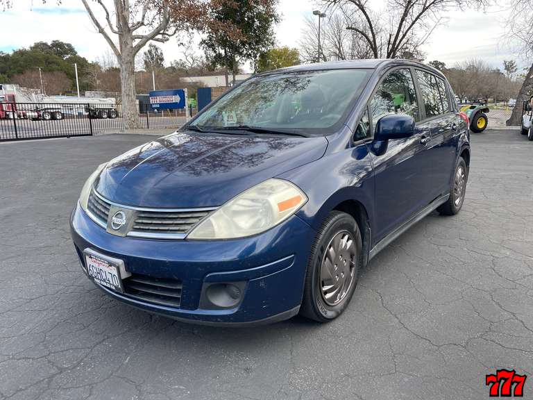2009 Nissan Versa with 148k miles