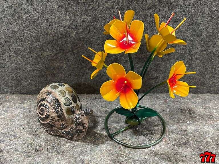 1 Metal Yellow Flower Stand & 1 Rock And Cement Snail