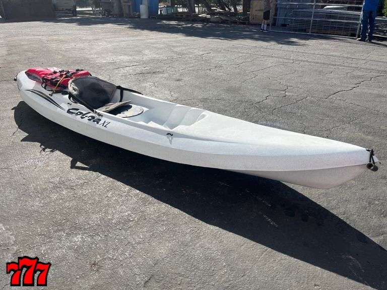 Cobra XL single person kayak with life jacket 777 Auction Company