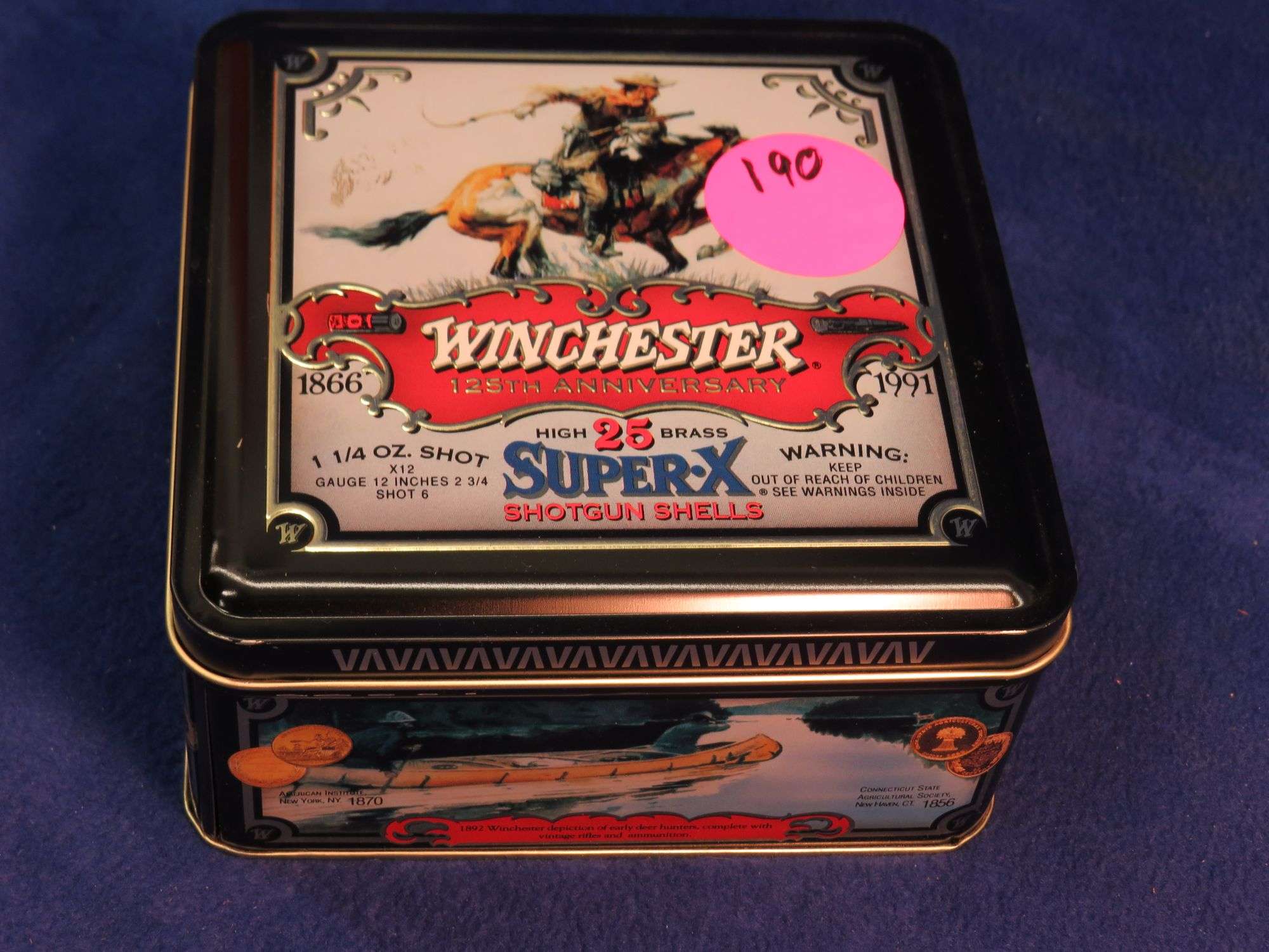 Collectible Winchester tin box commemorating Winchester's