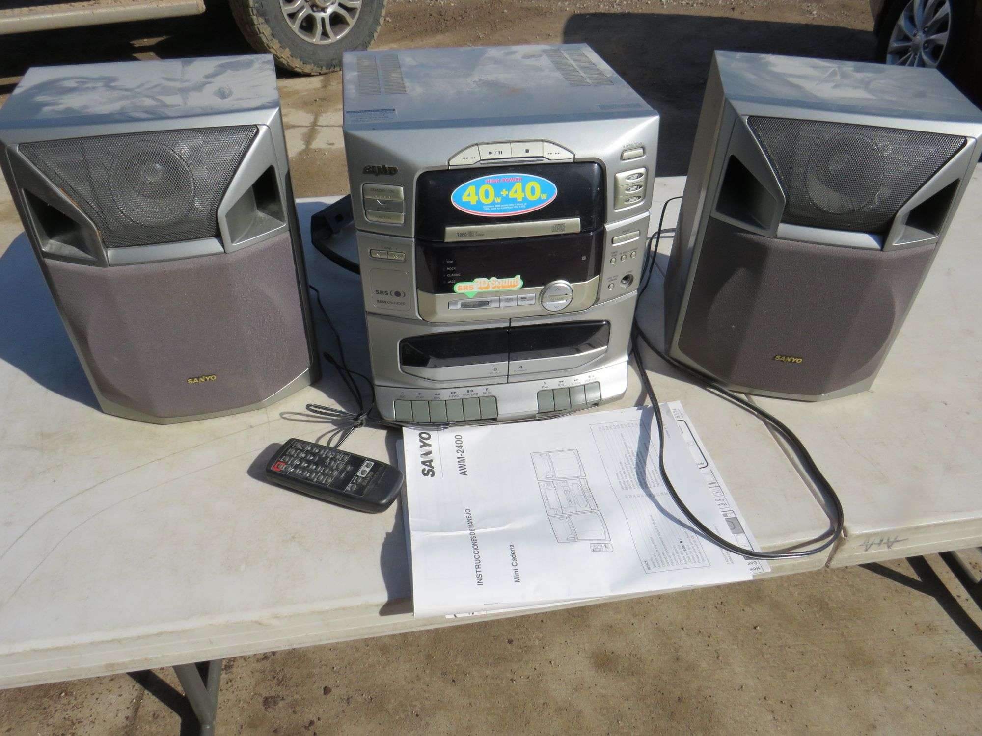SANYO mini-shelf stereo - AAA Auction and Realty