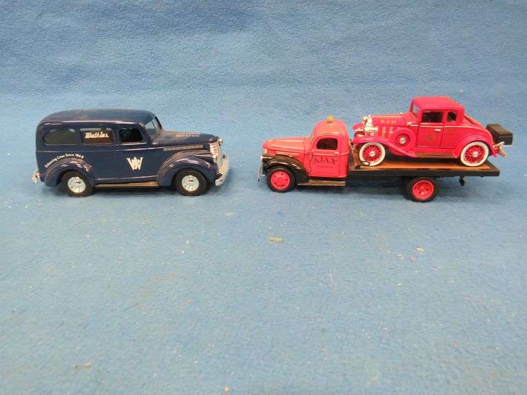 Watkins logo car with a locking compartment underneath and a 1:32 scale National Mint 1941 Chevrolet