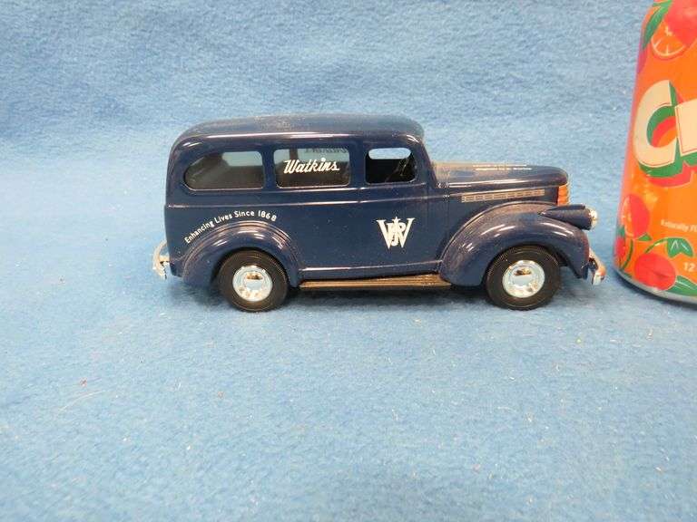 Watkins logo car with a locking compartment underneath and a 1:32 scale National Mint 1941 Chevrolet
