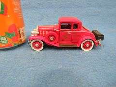 Watkins logo car with a locking compartment underneath and a 1:32 scale National Mint 1941 Chevrolet