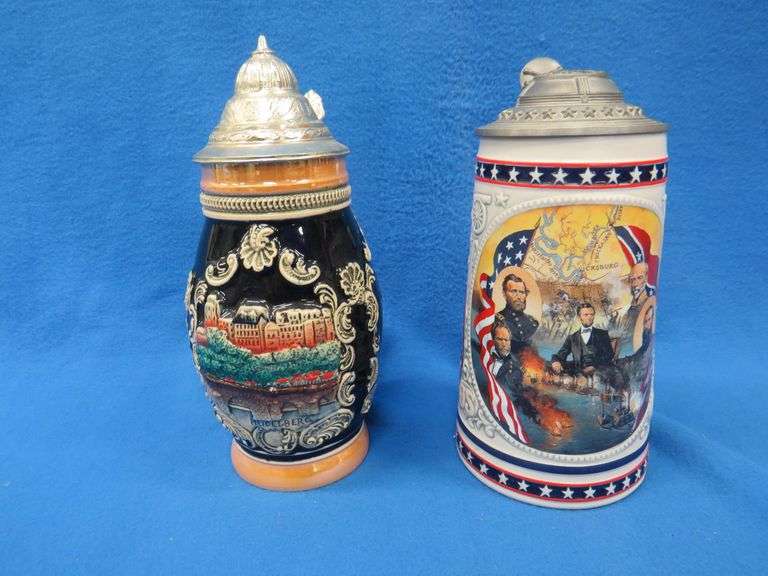 Two beer steins including a Civil War-themed one