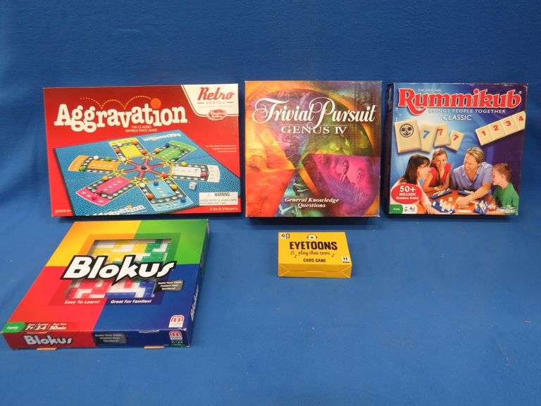 Board games including an unopened Trivial Pursuit