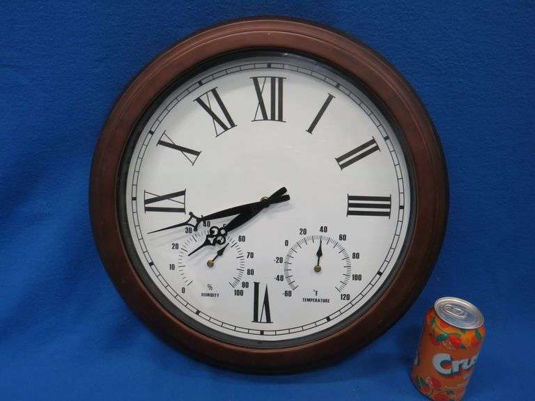 Battery-operated clock with temperature and humidity gauges