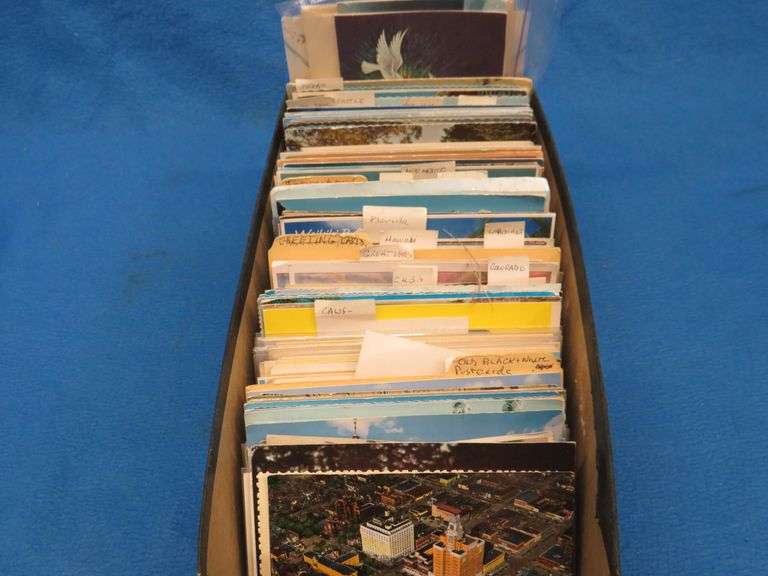 Shoebox full of postcards - AAA Auction and Realty