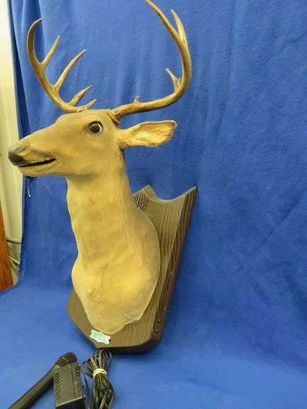Motion-activated mechanical singing deer. It moves and sings one of a handful of popular songs when
