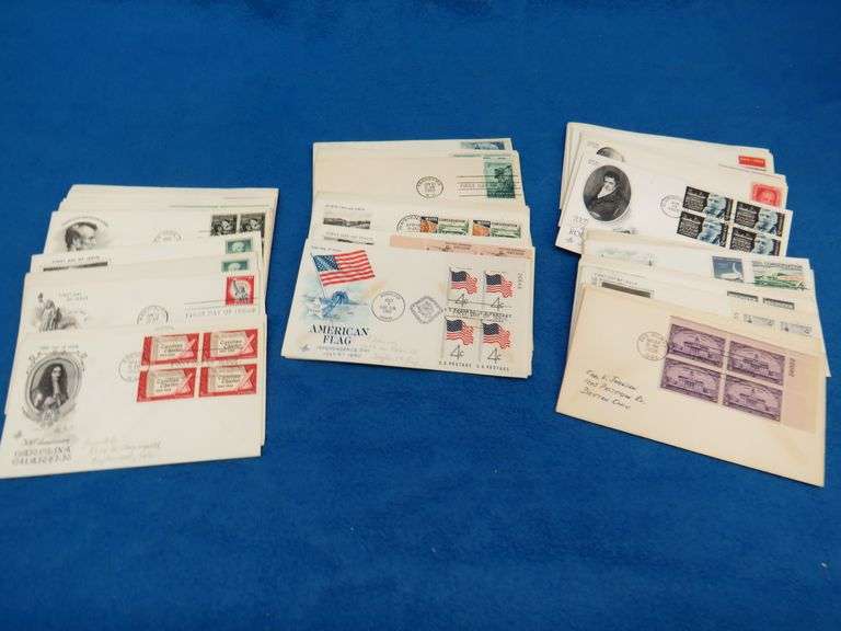 Over 50 First Day of Issue stamped envelopes