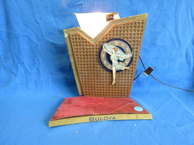 Vintage store display Bulova watch sign works and flashes.