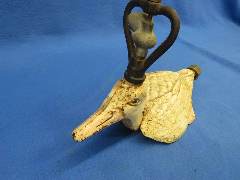 Antique cast iron painted mallard sprinkler with brass fittings, no markings found on casting