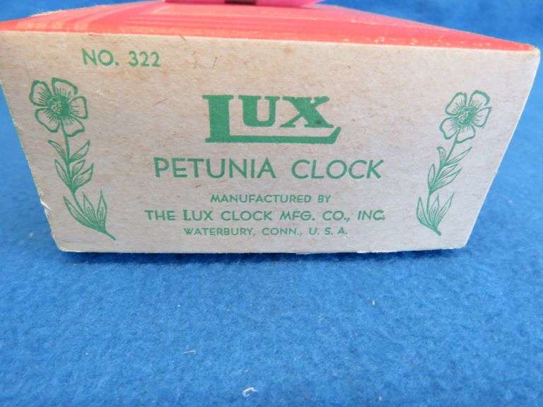 Petunia clock by Lux. Complete