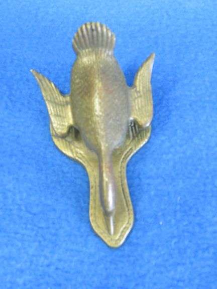 Cast iron door knockers and a brass paper clip goose