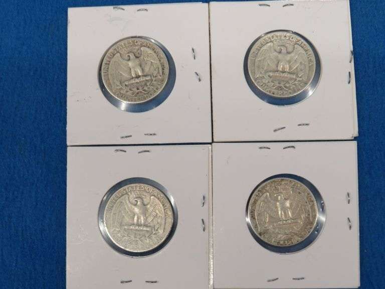 Four silver Washington quarters