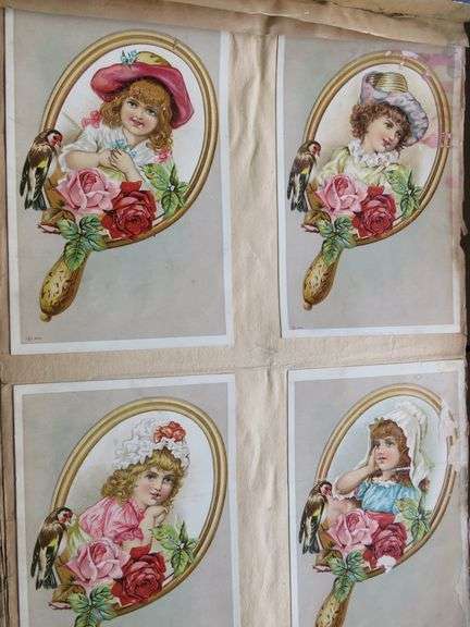 Two vintage early 20th-century scrapbooks, including whimsical anthropomorphic frog postcards and po