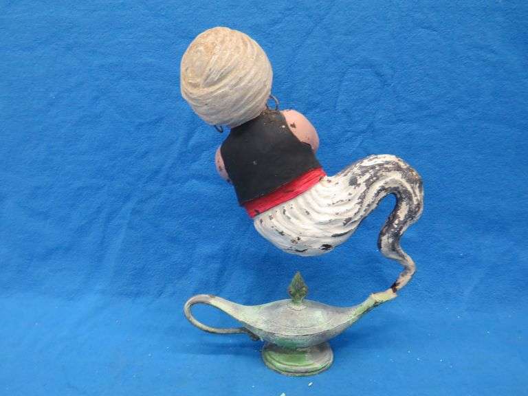 Two wishes left with this plaster Genie and bottle.  20" tall with original paint.