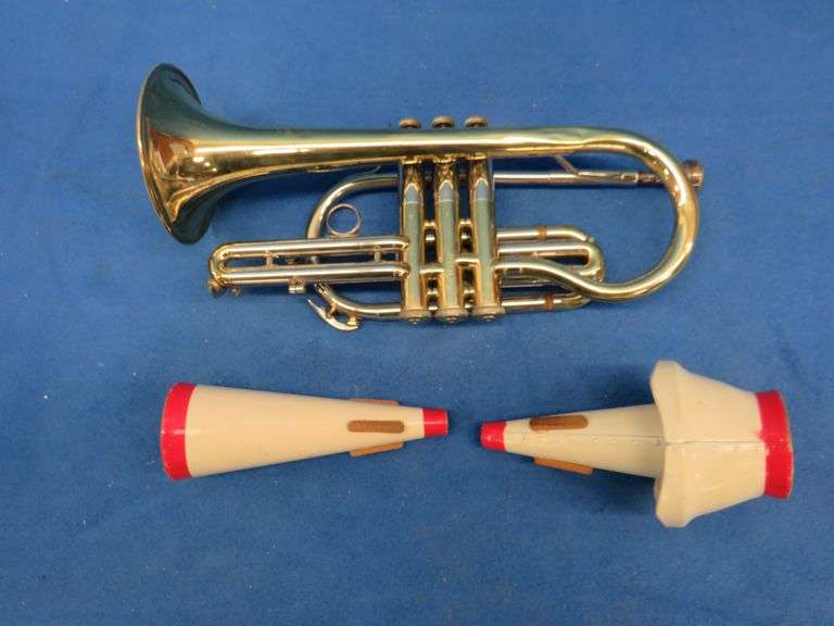 Frank Horton Model C301 cornet. Good used condition.  Valves work good.  Includes two mutes, case, a