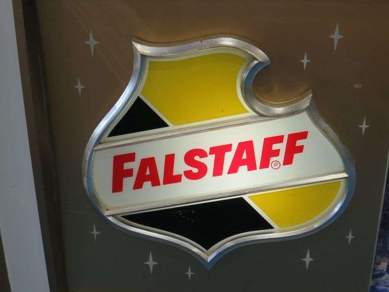 Falstaff American panorama backlit rolling motion sign.  Scenes changes from fall, winter, and summe