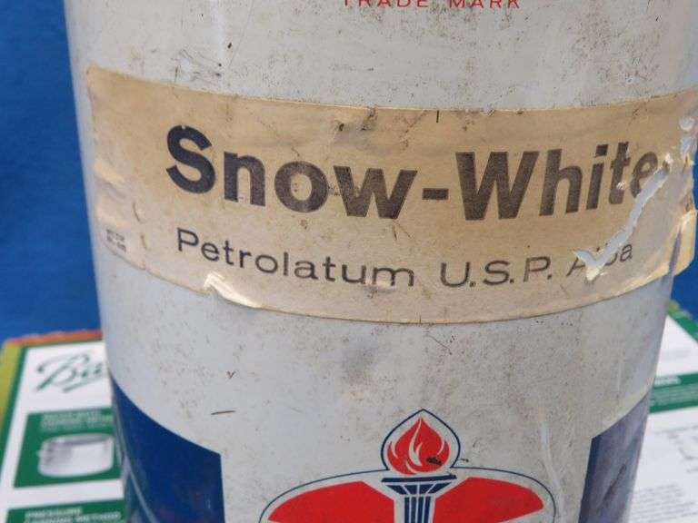 Vintage metal American Oil Snow-White Petrolatum can with contents