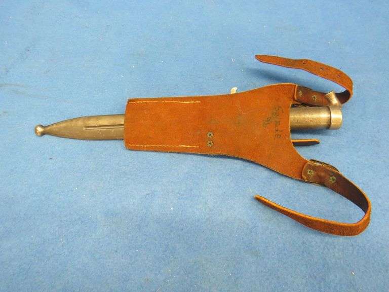 Swedish Mauser bayonet, metal sheath, and leather holder