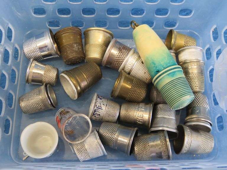 Thimbles and a vintage sewing kit