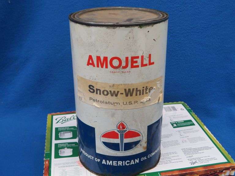 Vintage metal American Oil Snow-White Petrolatum can with contents