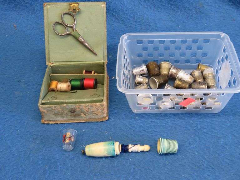 Thimbles and a vintage sewing kit