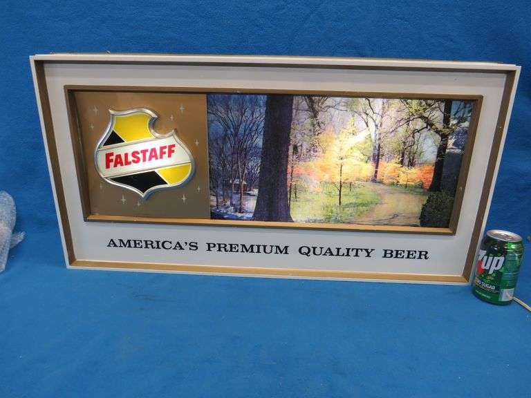 Falstaff American panorama backlit rolling motion sign.  Scenes changes from fall, winter, and summe