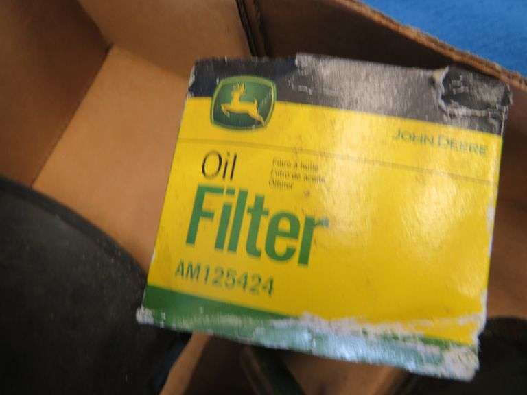 Grease gun, funnel, John Deere oil filter, and more