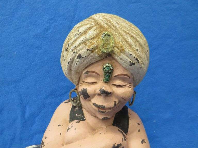 Two wishes left with this plaster Genie and bottle.  20" tall with original paint.
