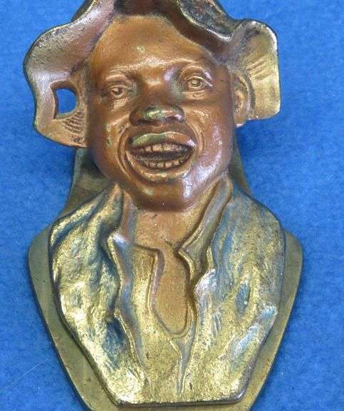 Black Americana antique cast iron paper clip or letter holder