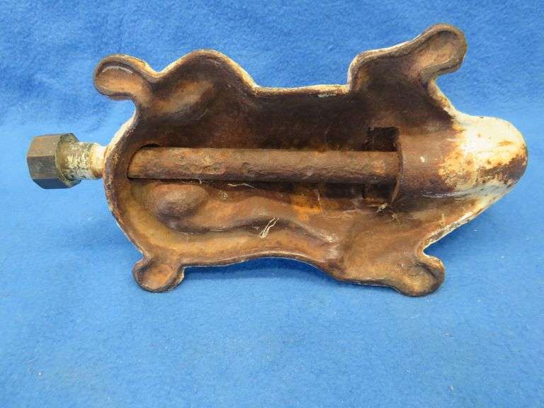 Antique cast iron lawn sprinkler in the form of an alligator.  Unknown maker.