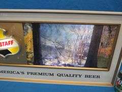 Falstaff American panorama backlit rolling motion sign.  Scenes changes from fall, winter, and summe