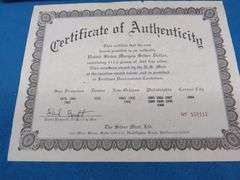 1884 CC Morgan silver dollar in BU condition with a Certificate of Authenticity and display box. Ple