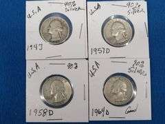Four silver Washington quarters