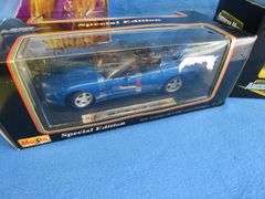 Hannah Montana game, Maisto 1998 Corvette Convertible 1:18, and an AM Muscle 1967 Corvette Stingray 