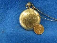 1912 working Elgin watch with chain.  25 year Keystone J. Boss gold filled case # 7596471. Elgin 15 
