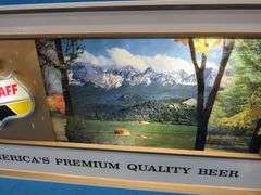 Falstaff American panorama backlit rolling motion sign.  Scenes changes from fall, winter, and summe