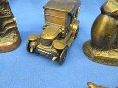 Seven collectible metal banks