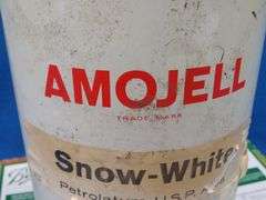 Vintage metal American Oil Snow-White Petrolatum can with contents