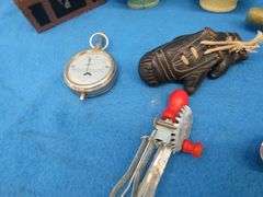 Collectible smalls including a child's egg beater, old amp gauge, vintage pipe, and more