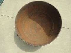 Vintage cast iron kettle 26" wide x 17" deep, has all three feet, marked 30 on the bottom