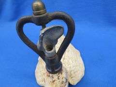 Antique cast iron painted mallard sprinkler with brass fittings, no markings found on casting