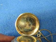 1912 working Elgin watch with chain.  25 year Keystone J. Boss gold filled case # 7596471. Elgin 15 