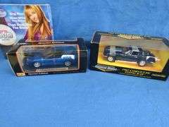 Hannah Montana game, Maisto 1998 Corvette Convertible 1:18, and an AM Muscle 1967 Corvette Stingray 