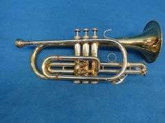 Frank Horton Model C301 cornet. Good used condition.  Valves work good.  Includes two mutes, case, a