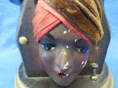 1920s era Kindel and Graham Gypsy head mechanical cigarette dispenser in working condition
